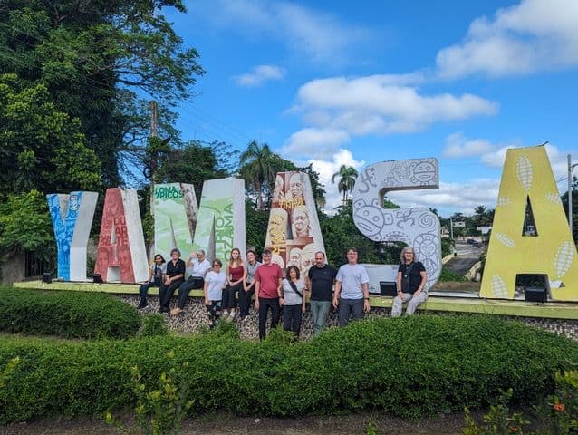 The Perry-Medico mission team gathered together in front of the colourful YAMASA letter sign in the Dominican Republic